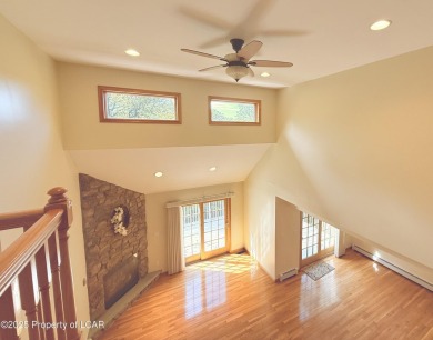 Custom-Built Home with Golf Course Views in Eagle Rock on Eagle Rock Golf and Ski Resort in Pennsylvania - for sale on GolfHomes.com, golf home, golf lot