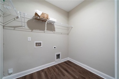 Discover life in The Georgian, one of Villa Rica's most on The Frog Golf Club in Georgia - for sale on GolfHomes.com, golf home, golf lot