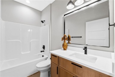 This exquisite custom home on a quiet cul-de-sac in The National on The Deuce At the National Golf Club of Kansas City in Missouri - for sale on GolfHomes.com, golf home, golf lot