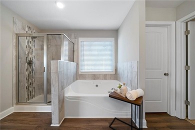 Discover life in The Georgian, one of Villa Rica's most on The Frog Golf Club in Georgia - for sale on GolfHomes.com, golf home, golf lot