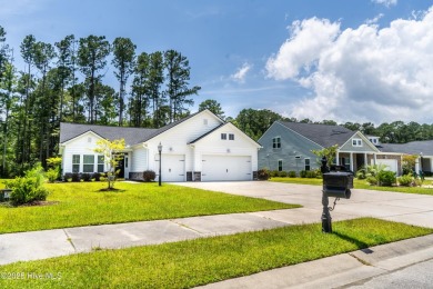 Welcome to 7956 N Balfour Drive--a beautifully maintained home on Brunswick Plantation and Golf Resorts in North Carolina - for sale on GolfHomes.com, golf home, golf lot