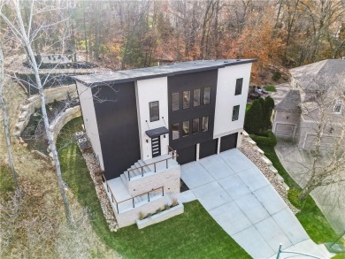 This exquisite custom home on a quiet cul-de-sac in The National on The Deuce At the National Golf Club of Kansas City in Missouri - for sale on GolfHomes.com, golf home, golf lot