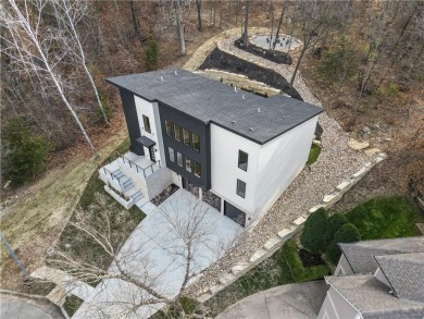 This exquisite custom home on a quiet cul-de-sac in The National on The Deuce At the National Golf Club of Kansas City in Missouri - for sale on GolfHomes.com, golf home, golf lot