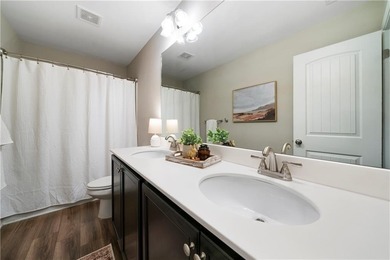 Discover life in The Georgian, one of Villa Rica's most on The Frog Golf Club in Georgia - for sale on GolfHomes.com, golf home, golf lot