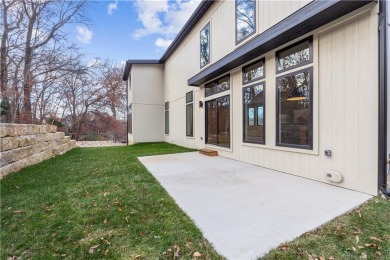 This exquisite custom home on a quiet cul-de-sac in The National on The Deuce At the National Golf Club of Kansas City in Missouri - for sale on GolfHomes.com, golf home, golf lot