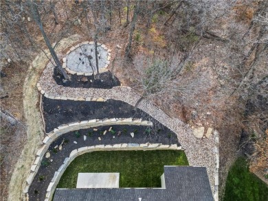 This exquisite custom home on a quiet cul-de-sac in The National on The Deuce At the National Golf Club of Kansas City in Missouri - for sale on GolfHomes.com, golf home, golf lot