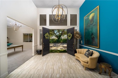 Truly remarkable home designed by Gary Kelly sits on almost 1/2 on Heritage Ridge Golf Club in Florida - for sale on GolfHomes.com, golf home, golf lot