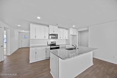 Single-story new construction home situated on Lot #5 on The Lakes Country Club in North Carolina - for sale on GolfHomes.com, golf home, golf lot