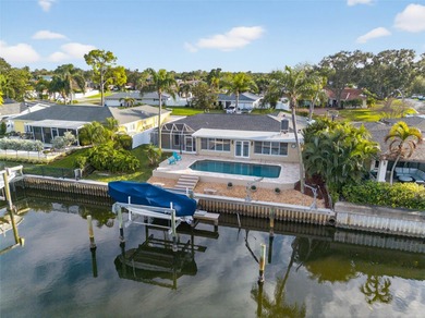 ~~WATERFRONT POOL HOME~~Discover the perfect blend of coastal on Mangrove Bay Golf Course in Florida - for sale on GolfHomes.com, golf home, golf lot