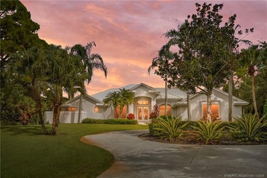 Beautifully updated 4BR/3.5BA CBS home on 1 acre in the gated on  in Florida - for sale on GolfHomes.com, golf home, golf lot