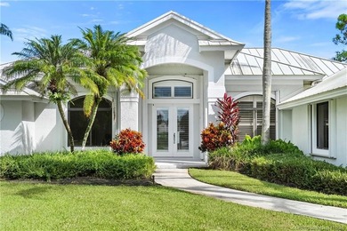 Beautifully updated 4BR/3.5BA CBS home on 1 acre in the gated on  in Florida - for sale on GolfHomes.com, golf home, golf lot