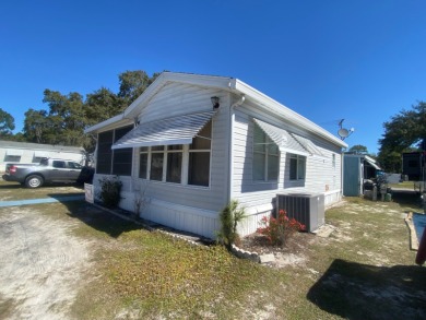 This one bedroom park model has been updated with a quartz on Clerbrook Resort, Inc. in Florida - for sale on GolfHomes.com, golf home, golf lot