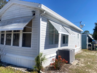 This one bedroom park model has been updated with a quartz on Clerbrook Resort, Inc. in Florida - for sale on GolfHomes.com, golf home, golf lot