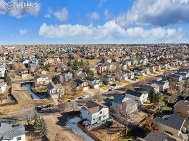 Welcome to this exceptional two-story home in Colorado Springs on Springs Ranch Golf Course in Colorado - for sale on GolfHomes.com, golf home, golf lot