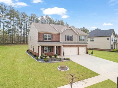 Welcome home to 8033 Louis Drive! A meticulously cared for on Canongate At Heron Bay in Georgia - for sale on GolfHomes.com, golf home, golf lot