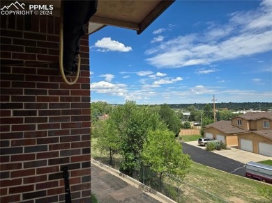 This is a wonderfully private end unit in a 55+ community near a on Valley Hi Golf Course in Colorado - for sale on GolfHomes.com, golf home, golf lot