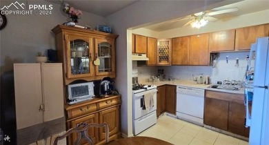 This is a wonderfully private end unit in a 55+ community near a on Valley Hi Golf Course in Colorado - for sale on GolfHomes.com, golf home, golf lot