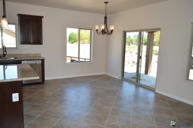 USDA zero down eligible new construction Santa Fe Style home in on The Links At Coyote Wash in Arizona - for sale on GolfHomes.com, golf home, golf lot