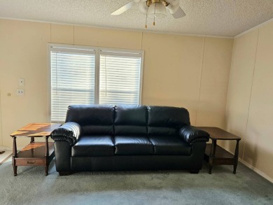 This home is on leased land. Buyers do not own the land. This on Big Cypress Golf and Country Club in Florida - for sale on GolfHomes.com, golf home, golf lot