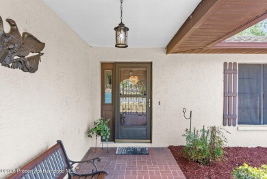 Welcome home to this charming and METICULOUSLY maintained on Oak Hills Country Club in Florida - for sale on GolfHomes.com, golf home, golf lot