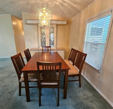 This home is on leased land. Buyers do not own the land. This on Big Cypress Golf and Country Club in Florida - for sale on GolfHomes.com, golf home, golf lot