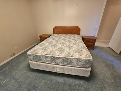 This home is on leased land. Buyers do not own the land. This on Big Cypress Golf and Country Club in Florida - for sale on GolfHomes.com, golf home, golf lot