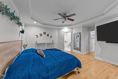 This stunning 5-bedroom, 4-bath home offers luxurious living on on The Neuse Golf Club in North Carolina - for sale on GolfHomes.com, golf home, golf lot