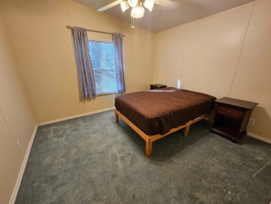 This home is on leased land. Buyers do not own the land. This on Big Cypress Golf and Country Club in Florida - for sale on GolfHomes.com, golf home, golf lot
