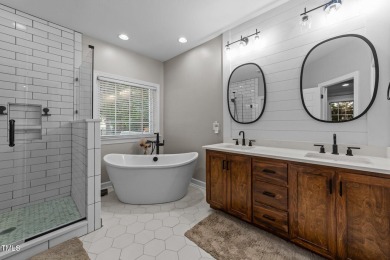This stunning 5-bedroom, 4-bath home offers luxurious living on on The Neuse Golf Club in North Carolina - for sale on GolfHomes.com, golf home, golf lot