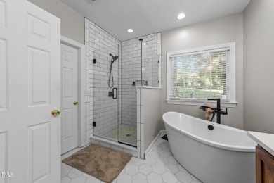 This stunning 5-bedroom, 4-bath home offers luxurious living on on The Neuse Golf Club in North Carolina - for sale on GolfHomes.com, golf home, golf lot