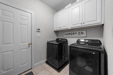 This stunning 5-bedroom, 4-bath home offers luxurious living on on The Neuse Golf Club in North Carolina - for sale on GolfHomes.com, golf home, golf lot