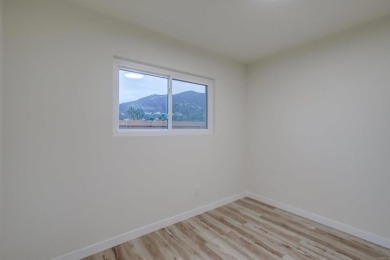 Beautifully remodeled 4-bedroom, 2-bath home nestled in the on Mission Trails Golf Course in California - for sale on GolfHomes.com, golf home, golf lot