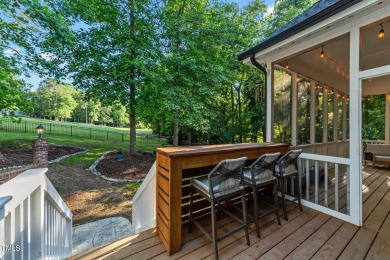 This stunning 5-bedroom, 4-bath home offers luxurious living on on The Neuse Golf Club in North Carolina - for sale on GolfHomes.com, golf home, golf lot