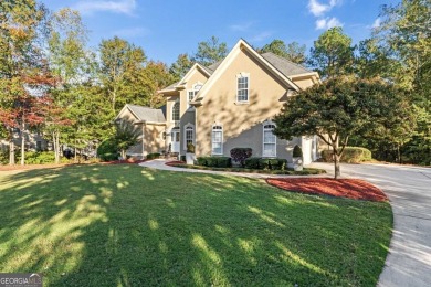 Experience luxury living at its finest in this custom-built home on Eagles Landing Country Club in Georgia - for sale on GolfHomes.com, golf home, golf lot