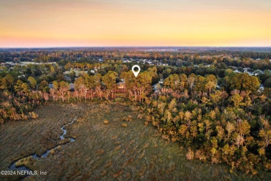 One of the last UNOBSTRUCTED Views from this MARSHFRONT LOT on Golf Club At North Hampton in Florida - for sale on GolfHomes.com, golf home, golf lot