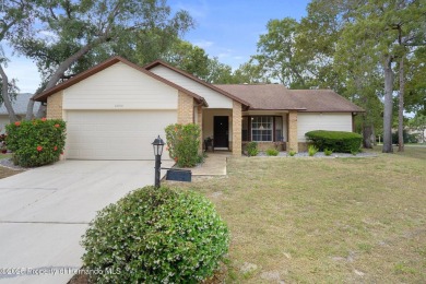 POOL HOME,  Enjoy this pool with spa home with 2021 pool heater on Timber Pines Golf Course in Florida - for sale on GolfHomes.com, golf home, golf lot