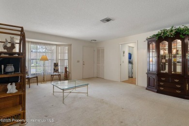 POOL HOME,  Enjoy this pool with spa home with 2021 pool heater on Timber Pines Golf Course in Florida - for sale on GolfHomes.com, golf home, golf lot