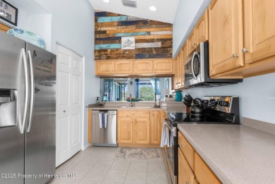 FANTASTIC MOVE IN READY POOL HOME with AWESOME REAR VIEW of HOLE on Heritage Pines Country Club in Florida - for sale on GolfHomes.com, golf home, golf lot