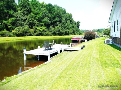 This immaculate home built by Bobby Carter Construction is easy on Players Course At Wyboo Plantation in South Carolina - for sale on GolfHomes.com, golf home, golf lot