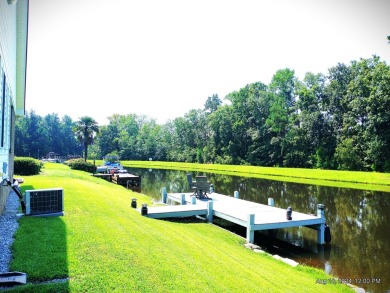 This immaculate home built by Bobby Carter Construction is easy on Players Course At Wyboo Plantation in South Carolina - for sale on GolfHomes.com, golf home, golf lot