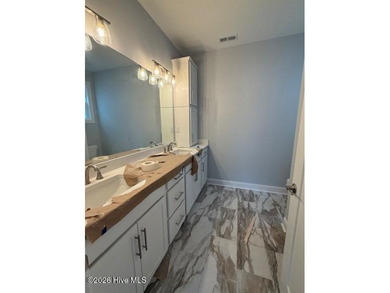 Charming bungalow-style ranch home located in the desirable on North River Club in North Carolina - for sale on GolfHomes.com, golf home, golf lot