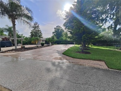 Prime Opportunity in The Woods: Upscale Gated on The Groves Golf and Country Club in Florida - for sale on GolfHomes.com, golf home, golf lot