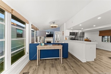 Charming and renovated is this 2 bedroom 1 bathroom getaway in on Island Dunes Country Club in Florida - for sale on GolfHomes.com, golf home, golf lot