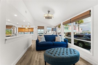 Charming and renovated is this 2 bedroom 1 bathroom getaway in on Island Dunes Country Club in Florida - for sale on GolfHomes.com, golf home, golf lot