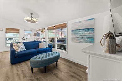 Charming and renovated is this 2 bedroom 1 bathroom getaway in on Island Dunes Country Club in Florida - for sale on GolfHomes.com, golf home, golf lot