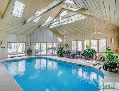 Discover luxury and serenity in this magnificent single-story on The Landings Club - Oakridge in Georgia - for sale on GolfHomes.com, golf home, golf lot