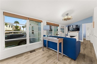 Charming and renovated is this 2 bedroom 1 bathroom getaway in on Island Dunes Country Club in Florida - for sale on GolfHomes.com, golf home, golf lot