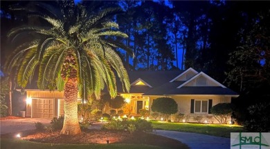 Discover luxury and serenity in this magnificent single-story on The Landings Club - Oakridge in Georgia - for sale on GolfHomes.com, golf home, golf lot