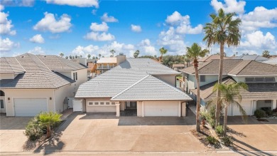 Ultimate coastal retreat at this stunning canal-front home in on Palmilla Beach Golf Club in Texas - for sale on GolfHomes.com, golf home, golf lot