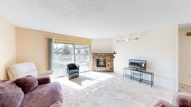 Wake up to mountain views and fresh alpine air in this 2-bedroom on Lake Estes Golf Course in Colorado - for sale on GolfHomes.com, golf home, golf lot